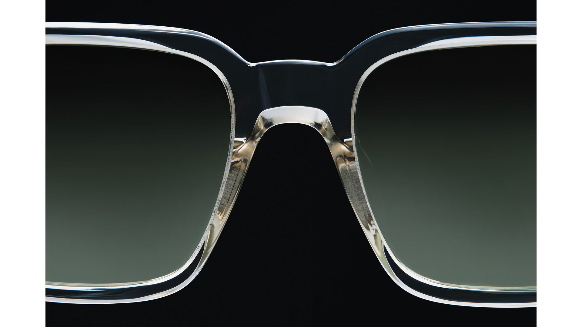 These sunglasses appear to be the Paul Smith Austin model, featuring a distinctive square frame with a transparent, laminated acetate finish.